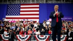 U.S. President Donald Trump arrives to speak at a campaign rally at Atlantic Aviation in Moon Township, Pa., March 10, 2018.