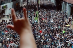 Anti-extradition bill protesters rally in Sha Tin district, Hong Kong, July 14, 2019.