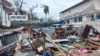 This photograph shows a pile of debris of metal sheets and wood after the cyclone Chido hit France's Indian Ocean territory of Mayotte, on Dec. 14, 2024 in the capital Mamoudzou. 