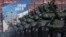 Russian tanks move along Red Square during a Victory Day parade, Moscow, May 9, 2013.