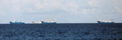 FILE - Chinese vessels are pictured in disputed South China Sea, April 21, 2017.