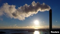 FILE - Smoke rises from the Hanasaari coal power plant in Helsinki, Finland, November 28, 2016. (Jussi Nukari/Lehtikuva/via REUTERS) 