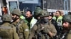 Israeli officials say bus shooting kills 3 in West Bank