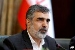Spokesman for Iran's atomic agency Behrouz Kamalvandi speaks in a press briefing in Tehran, Iran, Sunday, July 7, 2019. Iran's deputy foreign minister says that his nation considers the 2015 nuclear deal with world powers to be a "valid document."