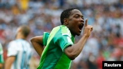 Nigeria's Ahmed Musa celebrates after scoring his team's second goal against Argentina during their 2014 World Cup Group F soccer match at the Beira Rio stadium in Porto Alegre June 25, 2014.