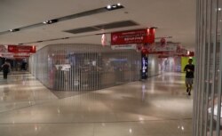 Closed stores are seen inside a shopping mall in Admiralty district, in Hong Kong, Oct. 5, 2019.