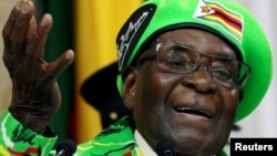 Zimbabwean President Robert Mugabe addresses a meeting of his ruling ZANU PF party's youth league in Harare, Zimbabwe, Oct. 7, 2017. 