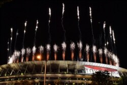 Fireworks go off around the Olympic Stadium during the closing ceremony of the Tokyo 2020 Olympic Games, as seen from outside the venue in Tokyo on Aug. 8, 2021. (Photo by Kazuhiro NOGI / AFP)
