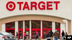 Shoppers arrive at a Target store in Los Angeles on Thursday, Dec. 19, 2013.