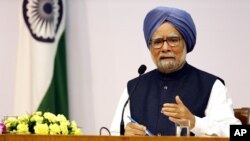 FILE - Indian Prime Minster Manmohan Singh addresses a press conference, in New Delhi, India.