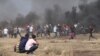 Clouded by Smoke and Tear Gas, a View from Deadly Gaza Protests