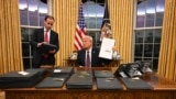 US President Donald Trump signs executive orders in the Oval Office of the WHite House in Washington, DC, on January 20, 2025. (Photo by Jim WATSON / POOL / AFP)
