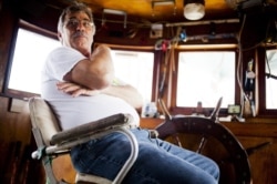 Louisiana shrimp and oyster fisherman George Barisich says the oil spill devastated the fishing industry. 'Places where we had 110 boats shrimping before the spill, we’ve now got 11,' he said. (Matt Haines/VOA)