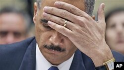 Attorney General Eric Holder testifies before the House Oversight and Government Reform Committee hearing entitled 'Fast & Furious: Management Failures at the Department of Justice,' on Capitol Hill in Washington, February 2, 2012.