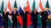 From left, Brazil's President Michel Temer, Russian President Vladimir Putin, Chinese President Xi Jinping, South Africa's President Jacob Zuma and Indian Prime Minister Narendra Modi pose for a group photo during the BRICS Summit at the Xiamen International Conference and Exhibition Center in Xiamen, southeastern China's Fujian Province, Sept. 4, 2017. 