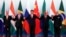 From left, Brazil's President Michel Temer, Russian President Vladimir Putin, Chinese President Xi Jinping, South Africa's President Jacob Zuma and Indian Prime Minister Narendra Modi pose for a group photo during the BRICS Summit at the Xiamen International Conference and Exhibition Center in Xiamen, southeastern China's Fujian Province, Sept. 4, 2017. 