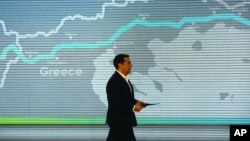 Greece's Prime Minister Alexis Tsipras goes to the podium to deliver a speech during the Trans- Adriatic Pipeline inauguration ceremony, in the northern Greek city of Thessaloniki, May 17, 2016. 