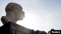 Terrence Floyd, brother of the late George Floyd who was killed by a police officer, reacts during the unveiling event of Floyd's statue, as part of Juneteenth celebrations, in Brooklyn, New York, June 19, 2021.