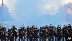 State patrol clears an area after curfew May 30, 2020, in Minneapolis.