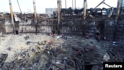 Расчистување на урнатините на местото на терористичкиот напад во Градското собрание Крокус, 26 март 2024 година. Russian Emergencies Ministry/Handout via REUTERS