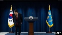 FILE - This handout photo taken and released on December 7, 2024 by the South Korean Presidential Office shows South Korea's President Yoon Suk Yeol bowing after the end of his address at the Presidential Office in Seoul.