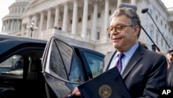 Sen. Al Franken, D-Minnesota, leaves the Capitol after speaking on the Senate floor, Dec. 7, 2017, on Capitol Hill in Washington. 
