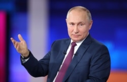 Russian President Vladimir Putin speaks during an annual nationwide televised phone-in show in Moscow, June 30, 2021.