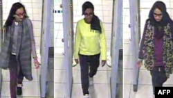 FILE - A combination of handout CCTV pictures received from the Metropolitan Police Service shows, from left, British teenagers Kadiza Sultana, Amira Abase and Shamima Begum passing through security barriers at Gatwick Airport, south of London, on Feb. 17, 2015.