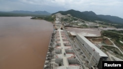 FILE - Ethiopia's Grand Renaissance Dam is seen as it undergoes construction work on the river Nile in Guba Woreda, Benishangul Gumuz Region, Ethiopia, Sept. 26, 2019. 