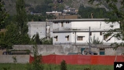 This May 2, 2011 file photo shows Osama bin Laden's compound in Abbottabad, Pakistan shortly after the raid that killed the al-Qaida leader. 