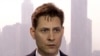 FILE -Image made from a video on March 28, 2018 shows Michael Kovrig, an adviser with the International Crisis Group, a Brussels-based non-governmental organization, speaking during an interview in Hong Kong. 