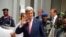 U.S. Secretary of State John Kerry waves after a visit to the sultan's palace in Sokoto, Nigeria, Aug. 23, 2016.