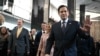 FILE - U.S. Secretary of State Marco Rubio and his wife Jeanette Rubio arrive to speak to employees upon arrival at the State Department in Washington, on Jan. 21, 2025.
