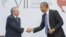 US President Barack Obama and Cuban President Raul Castro shake hands during their meeting at the Summit of the Americas in Panama City, Panama, April 11, 2015.