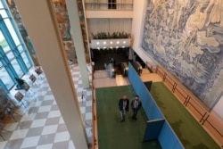 Delegates arrive for the the 75th session of the U.N. General Assembly, Sept. 23, 2020, at U.N. headquarters. This year's annual gathering of world leaders at U.N. headquarters will be almost entirely "virtual."