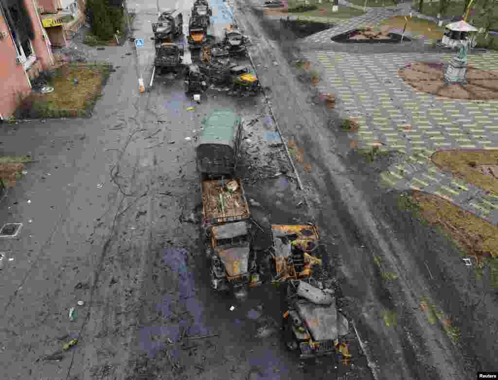 Destroyed Russian military vehicles are seen on a street in the settlement of Borodyanka in the Kyiv region as Russia's invasion of Ukraine continues, March 3, 2022.