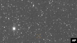 Pantauan pergerakan asteroid 2024 YR4 selama satu jam pada 27 Desember 2024. (Foto: ATLAS/University of Hawaii/NASA via AP)