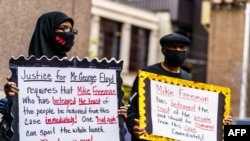 Protesters gather outside the Public Safety Facility building before former Minneapolis police officer Derek Chauvin will be charged in the death of Floyd George, in Minneapolis, Minnesota, June 29, 2020. 