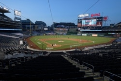 The Washington Nationals bat against the Toronto Blue Jays during the seventh inning of a baseball game Monday, July 27, 2020, in Washington.