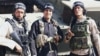 The crew of "Paytakht-5" comedy show is seen in Islamic State uniforms. 