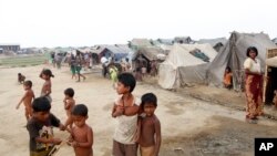 Riders cycle during the 188-km (116.8 miles) 11th stage of the 102nd Tour de France cycling race from Pau to Cauterets in the French Pyrenees mountains.