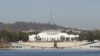 FILE - Australia's Parliament House sits behind Lake Burley Griffin in Canberra, Australia, Thursday, April 24, 2008. 