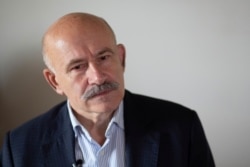 FILE - Pavel Palazhchenko, former chief interpreter for Soviet leader Mikhail Gorbachev, speaks during his interview to the Associated Press in Moscow, Russia, July 23, 2018.