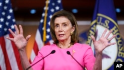 Speaker of the House Nancy Pelosi, D-Calif., updates reporters on Democratic efforts to pass President Joe Biden's 'Build Back Better' agenda, at the Capitol in Washington, Sept. 23, 2021. 