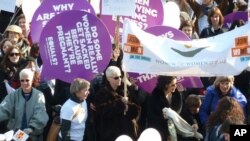 Women are joining together in London for Women International's 'Join me on the Bridge' campaign 2011