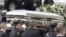 The coffin holding the remains of singer Whitney Houston is carried to a hearse in February 2012, after funeral services in New Jersey, which were seen by millions online. 