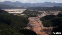 General view from above of a dam owned by Vale SA and BHP Billiton Ltd. that burst, in Mariana, Brazil, Nov. 10, 2015.