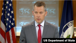 A civilian who escaped Islamic State territory phones his family he left behind, in Abu Saif, Iraq. Iraqi forces advanced into the southern outskirts of Mosul in a push to drive Islamic State militants from the city's western half.