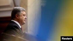 Ukrainian President Petro Poroshenko delivers a speech to parliament in Kyiv, Ukraine, Sept. 7, 2017. 