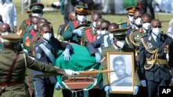Pallbearers carry the coffin of Kenneth Kaunda, founding president of Zambia, during his state funeral in Lusaka, Zambia, July 2, 2021.